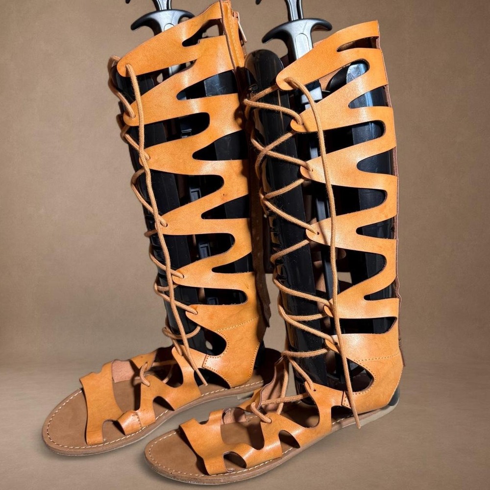Express knee-high gladiator sandals in a cognac brown faux leather lace-up front